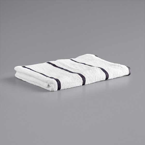 A dark gray towel with white stripes on it.