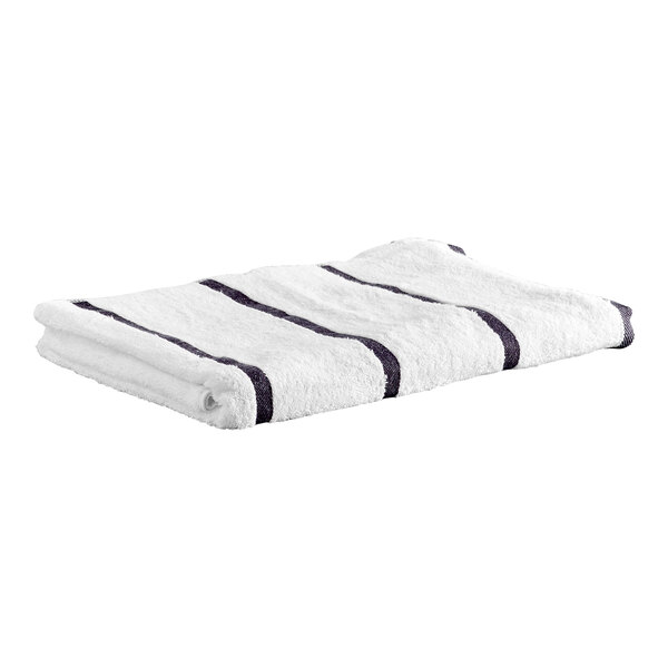 A folded white towel with dark gray horizontal stripes.