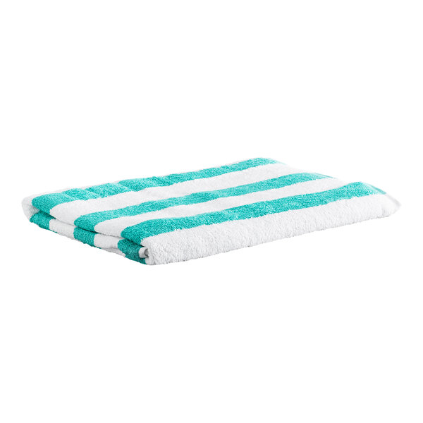 A folded towel with alternating green and white stripes.