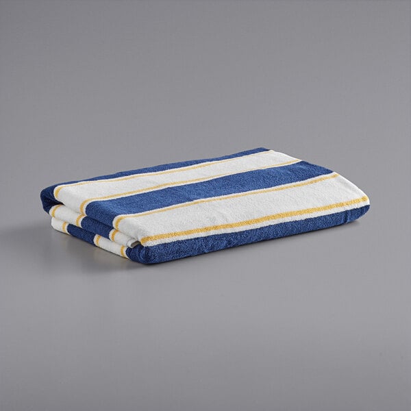 A navy blue and yellow striped Monarch Brands pool towel.
