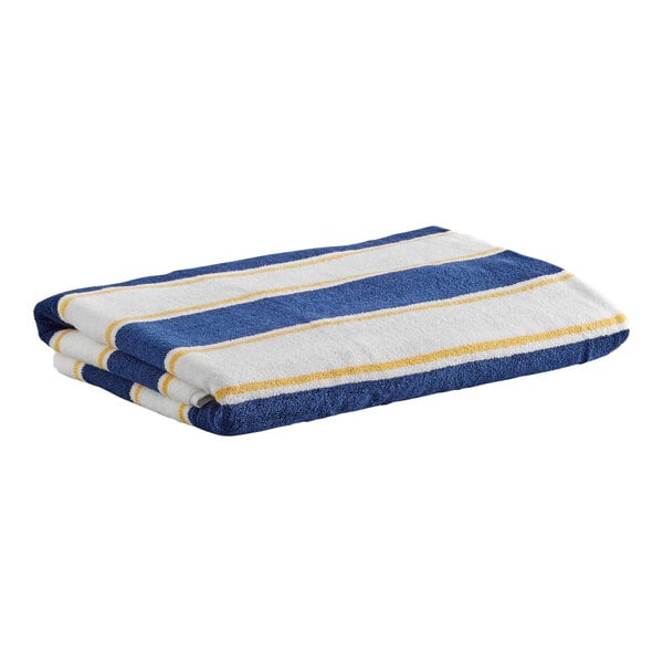 A folded towel with wide navy blue and white stripes separated by thin yellow lines.