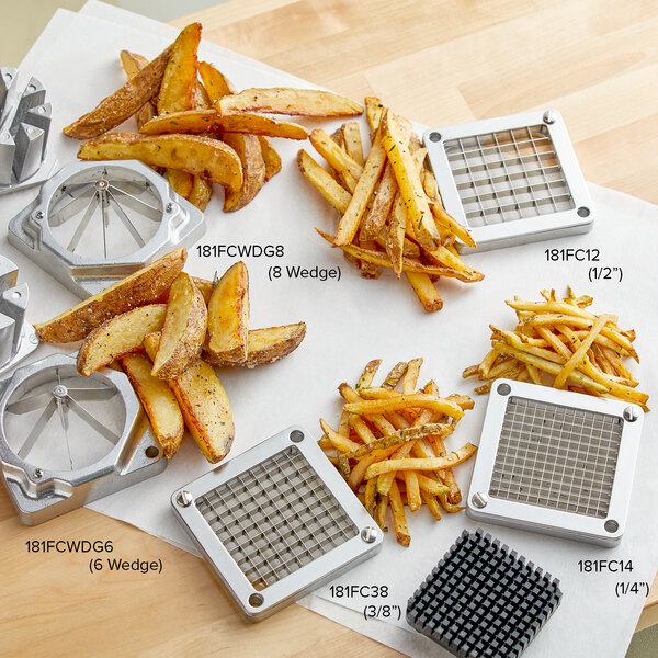 A Garde potato wedge cutter on a white square cutting board with freshly cut fries.
