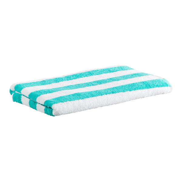 A folded towel with alternating green and white stripes.