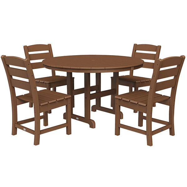 A POLYWOOD teak table with four chairs on an outdoor patio.