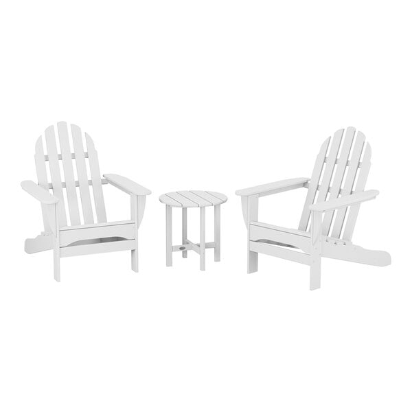 A group of three white POLYWOOD Adirondack chairs and round table.