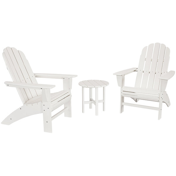 A white POLYWOOD patio set with 2 Adirondack chairs and a round table.