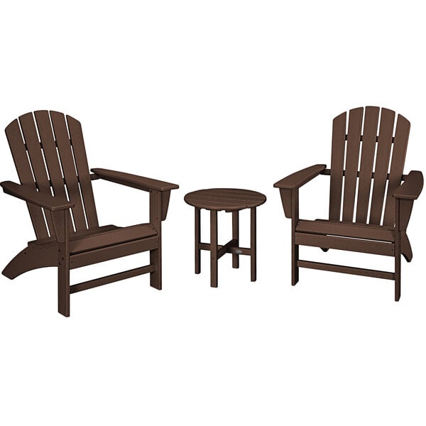 A group of brown POLYWOOD Adirondack chairs and a round table on an outdoor patio.
