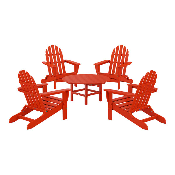 A group of red POLYWOOD Adirondack chairs around a table.
