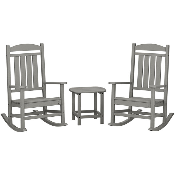 A POLYWOOD slate grey patio set with 2 rocking chairs and a table.