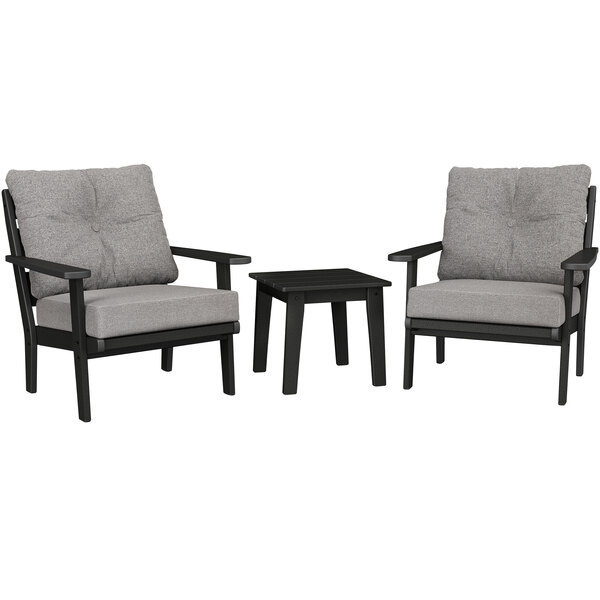 A POLYWOOD Lakeside table and chairs set with black and grey chairs.
