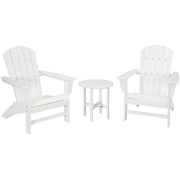 A group of three white POLYWOOD Nautical Adirondack chairs and a round table.