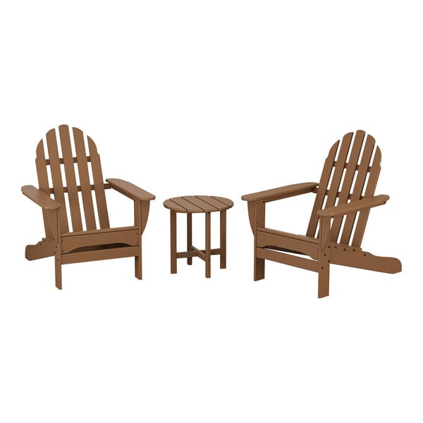 A group of brown POLYWOOD Adirondack chairs and a round table on an outdoor patio.