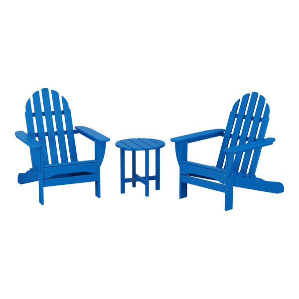 Three blue POLYWOOD Adirondack chairs and a round table.