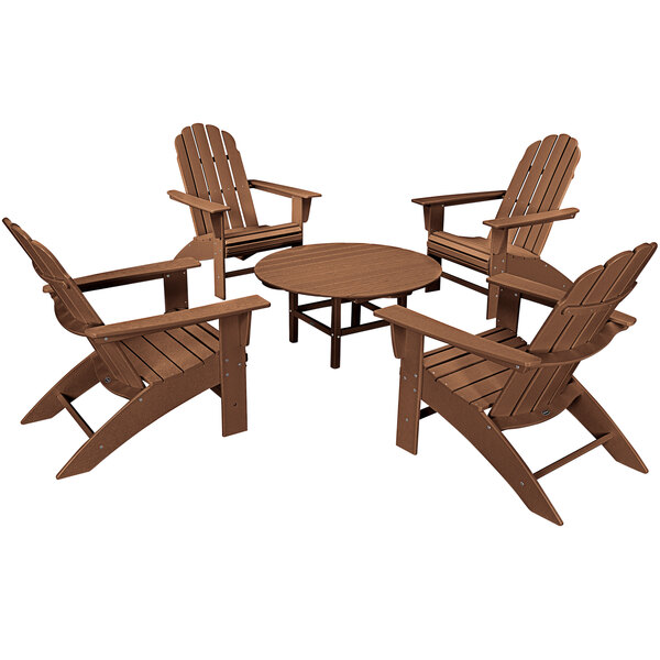 A POLYWOOD teak table with four chairs on an outdoor patio.
