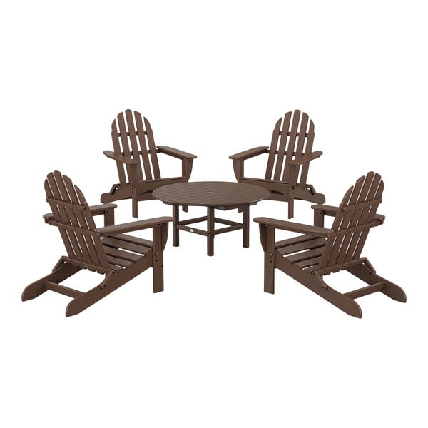 A brown POLYWOOD outdoor table with four chairs around it.