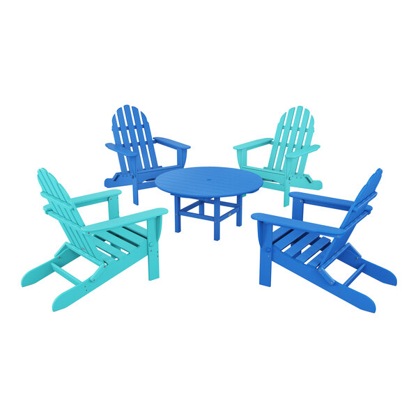 A group of blue POLYWOOD Adirondack chairs around a round table.
