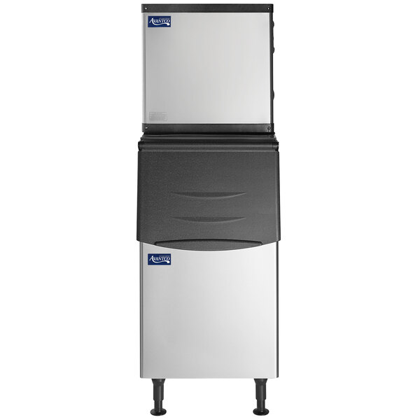 An Avantco stainless steel air cooled modular ice machine with bin.