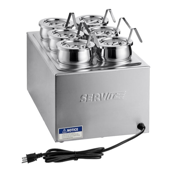 A stainless steel countertop appliance with six round containers, each with a hinged lid and ladle, and an attached power cord.