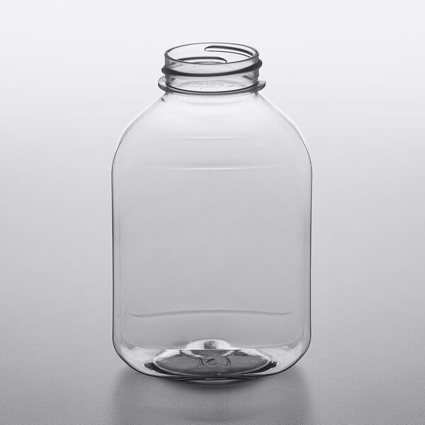 A clear plastic bottle with a lid.