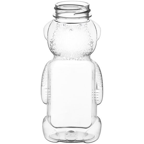 A clear plastic bear shaped container with a lid.