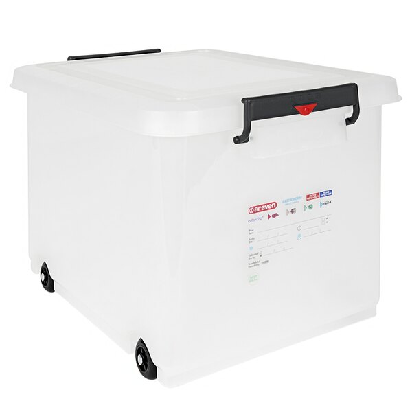 An Araven white polyethylene plastic mobile food box with black wheels.