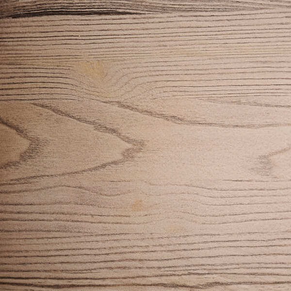The gray wood seat of a Lancaster Table & Seating restaurant chair with scratches.
