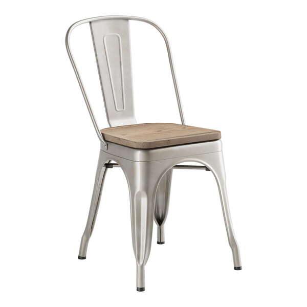 A Lancaster Table & Seating silver metal cafe chair with a gray wood seat.