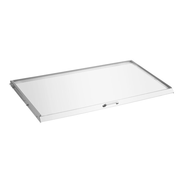 A clear rectangular lid with a metal handle.