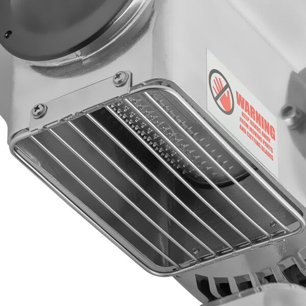 An Estella electric hard cheese grater with a metal grate.