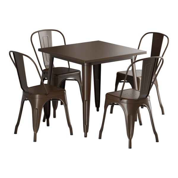 A Lancaster Table & Seating Alloy Series copper table with four brown metal chairs.