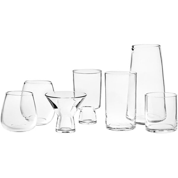 A close-up of an Acopa Pangea stemless wine glass full of white liquid.