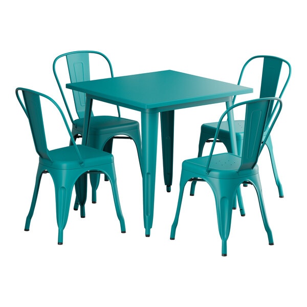 A teal square Lancaster Table & Seating outdoor table with chairs around it.