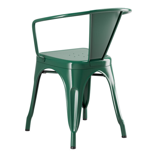 An Emerald green metal arm chair with a backrest on a outdoor patio table.