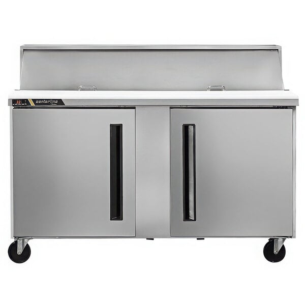 A stainless steel Traulsen refrigerator with 2 doors on a counter.