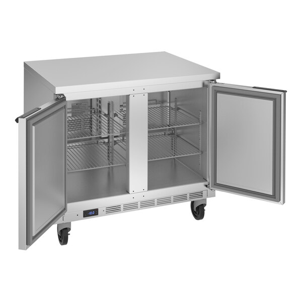 A stainless steel Beverage-Air worktop freezer with two doors open.