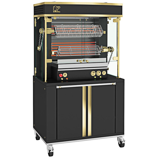 A black and gold Rotisol-France electric rotisserie with 2 spits and brass accents.