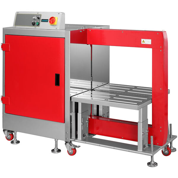 A red and silver PAC Strapping automatic bottom seal strapping machine with a red door.