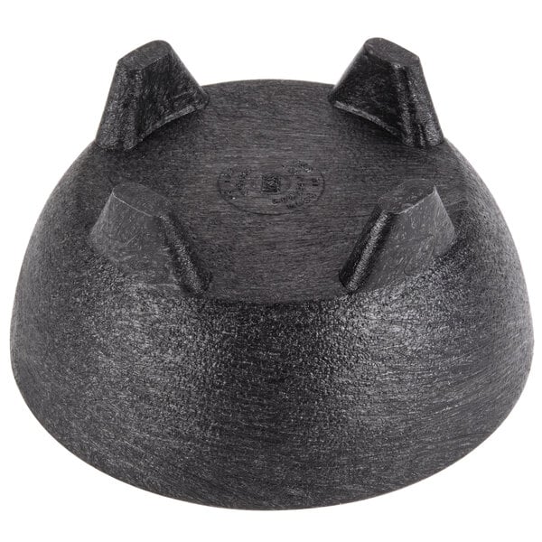 A black polypropylene molcajete with four pointy edges.