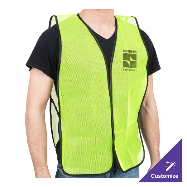 A man wearing a lime high visibility mesh safety vest.
