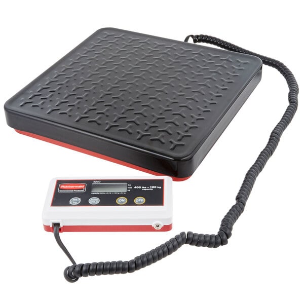 A black Rubbermaid receiving scale with a cord attached to it.
