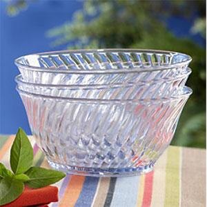 A stack of clear GET round dessert dishes.