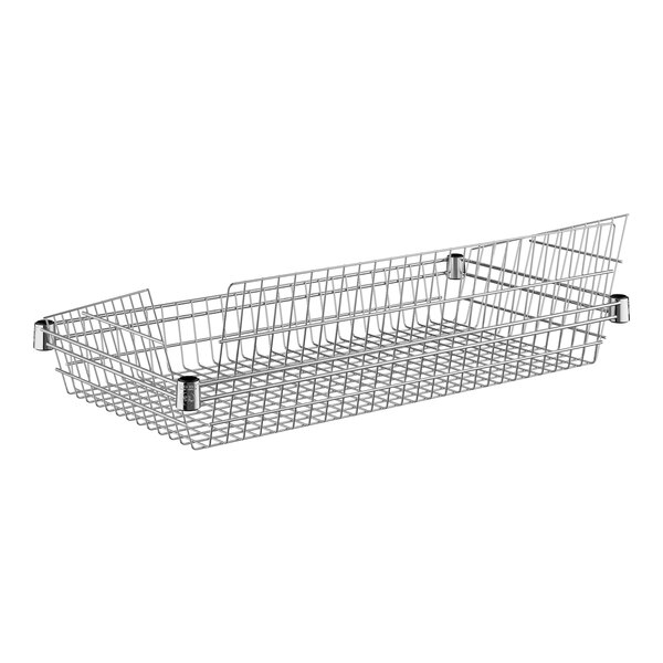 A Regency chrome wire basket with a handle.