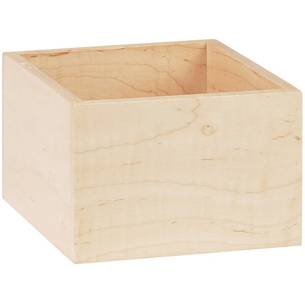 A Cal-Mil maple wood box with a lid and a hole.
