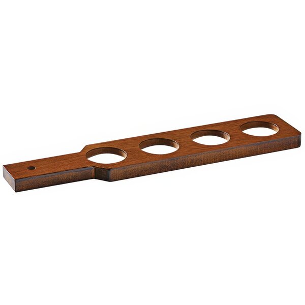 A mahogany wooden flight paddle with four holes.