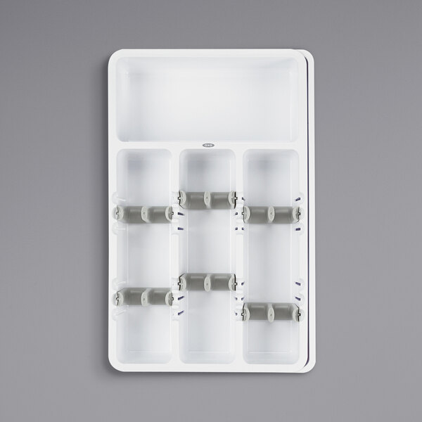 A white plastic tray with six compartments.