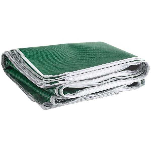 a stack of green and white bags