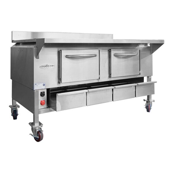 A large stainless steel Champion Tuff Grills wood burning grill on a counter.