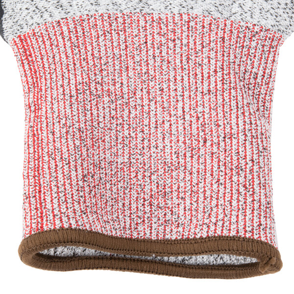 A close up of Cordova Machinist cut resistant gloves with a black and white striped knitted fabric.