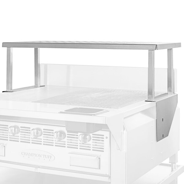 A stainless steel Champion Tuff Grills overshelf on a white surface above a grill.