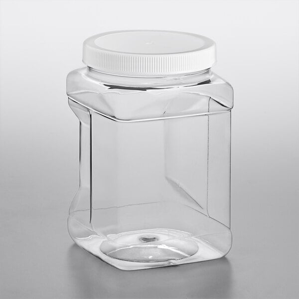 A clear plastic 64 oz. square container with a white lid.